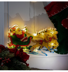 Kalėdų dekoracijos ant lango Kalėdų senelio rogės