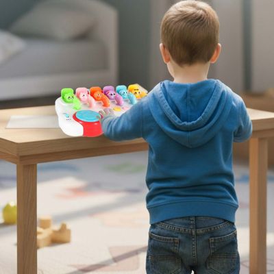 Mokomasis autobusas, žaidžiantis iššokančius gyvūnų raktus